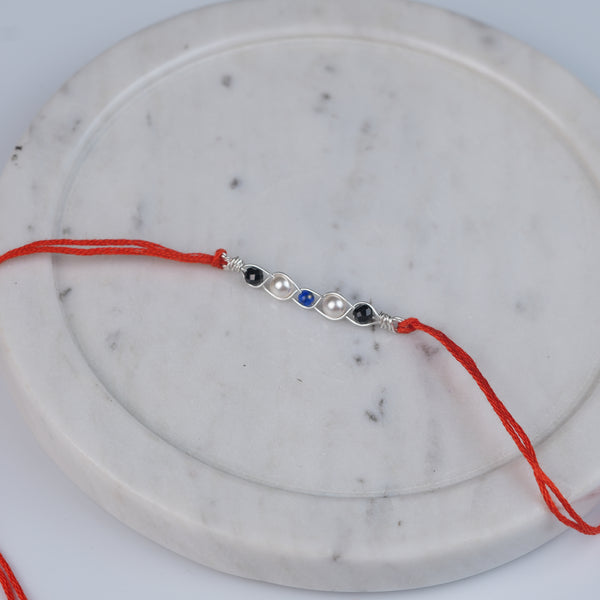 Evil Eye Wrapped Rakhi (Project Handmade)
