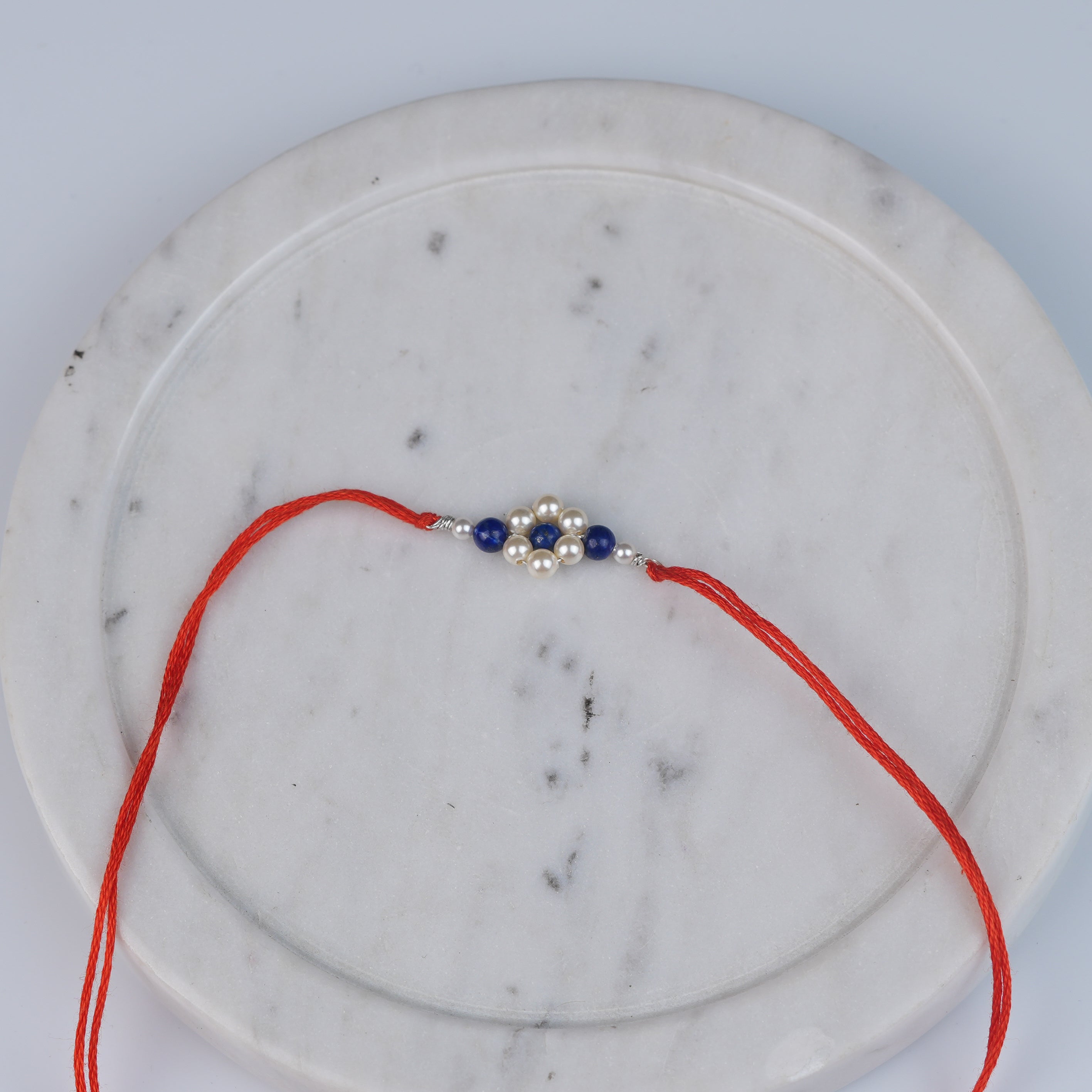 Lapis Lazuli & Pearl Flower Rakhi (Project Handmade)