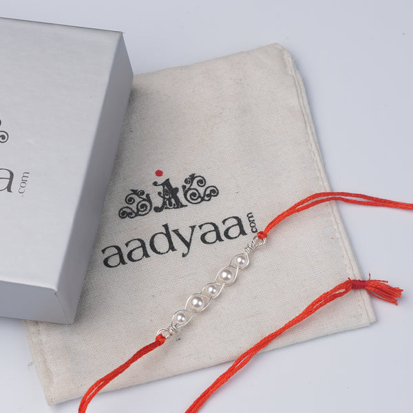 Pearl Wrapped Rakhi (Project Handmade)