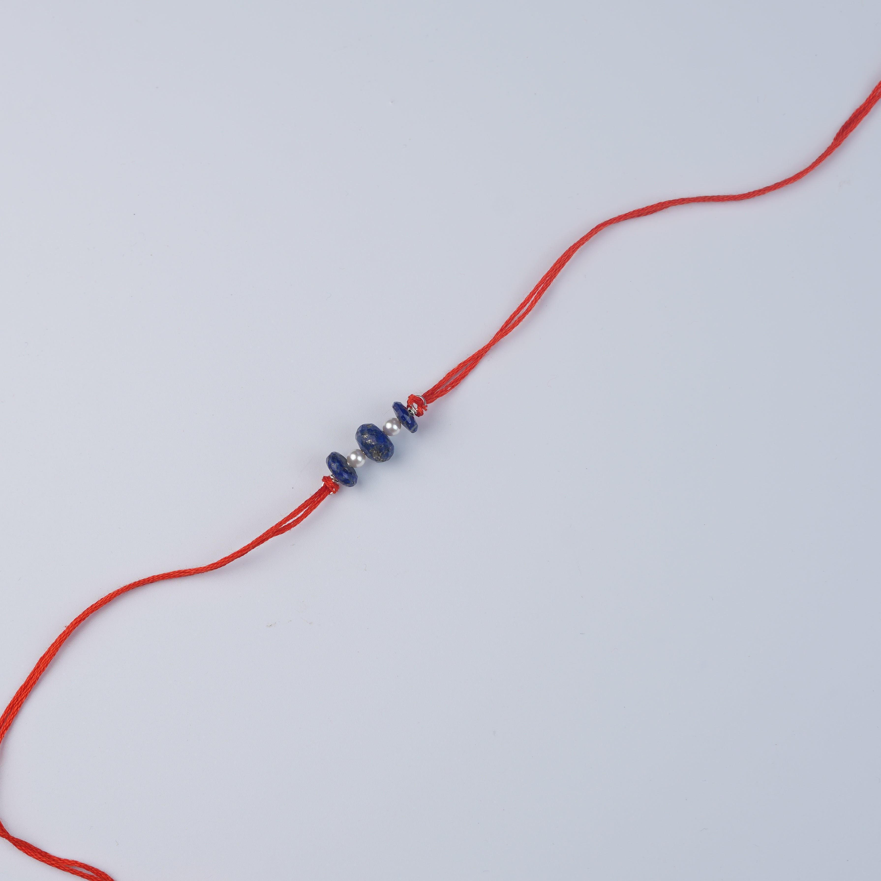 Flat Lapis Lazuli & Pearl Rakhi (Project Handmade)