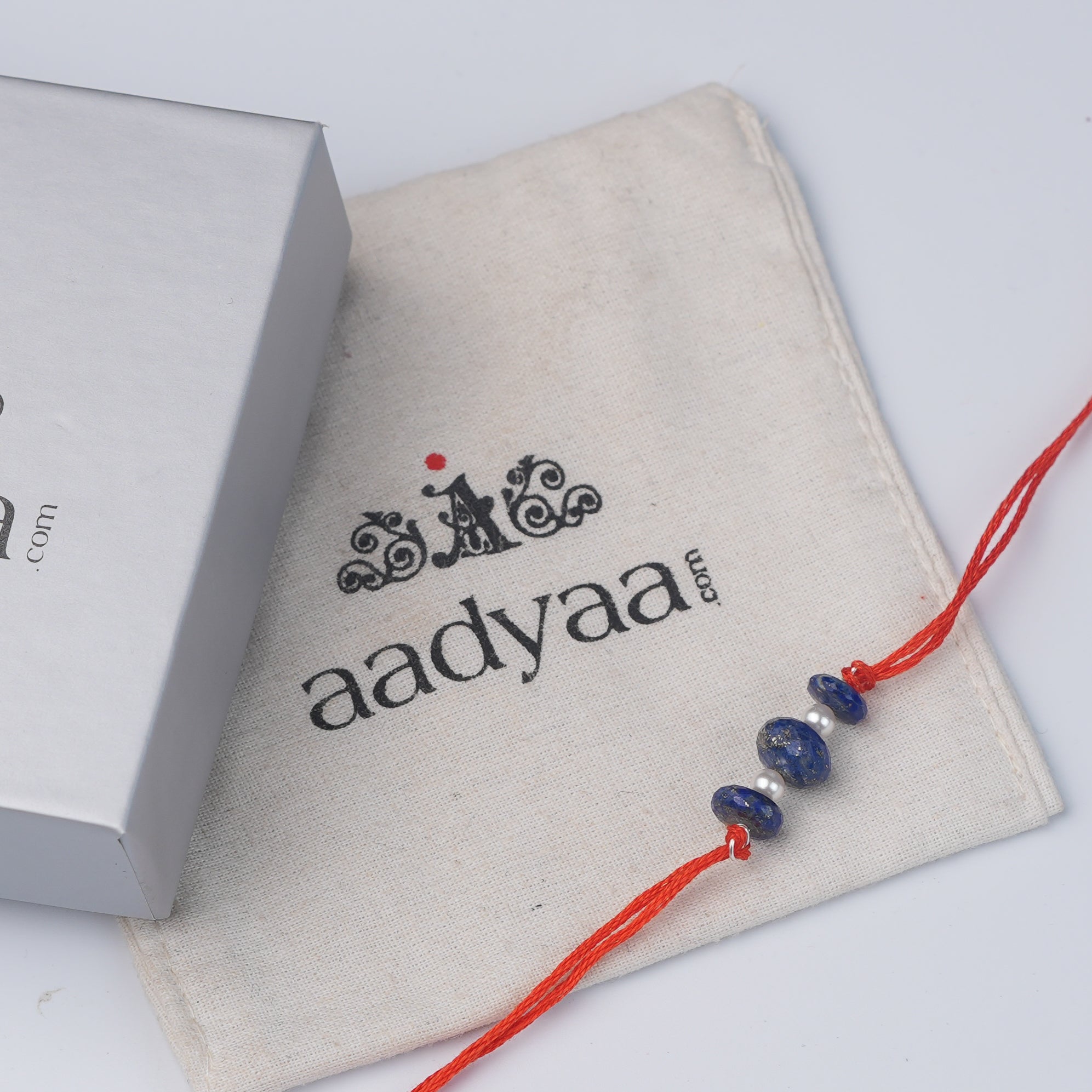 Flat Lapis Lazuli & Pearl Rakhi (Project Handmade)