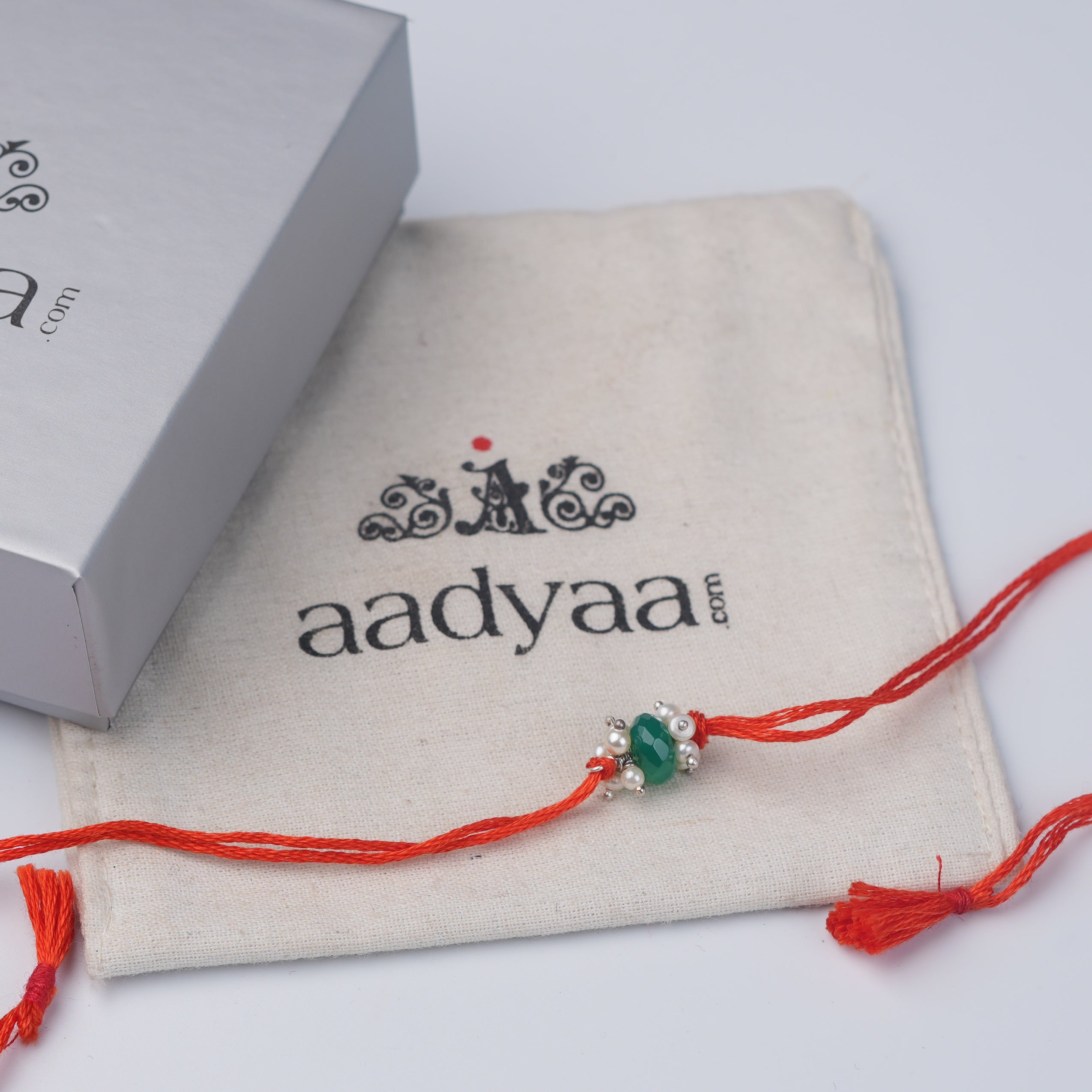 Green Onyx & Pearl Bunch Rakhi (Project Handmade)