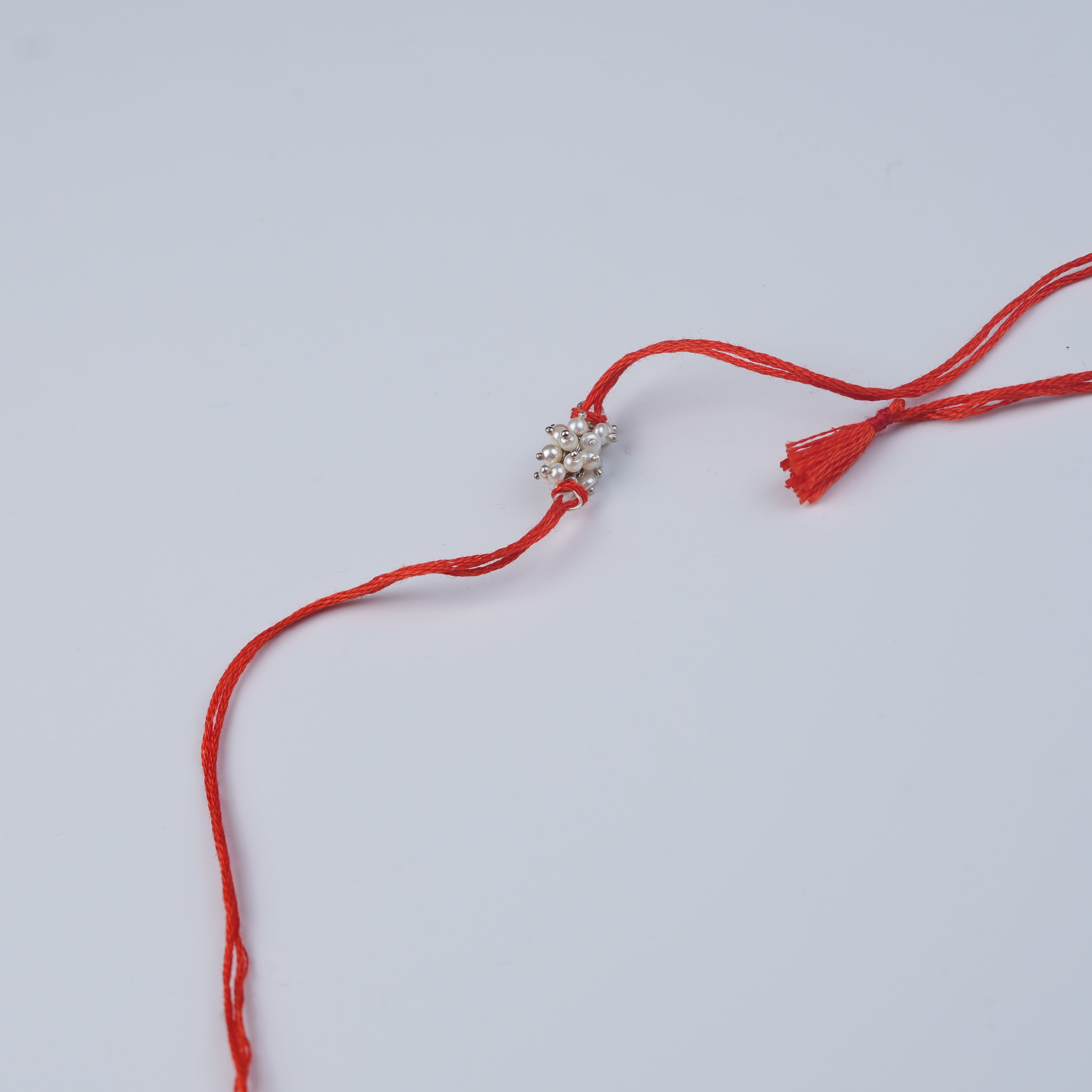 Pearl Bunch Rakhi (Project Handmade)