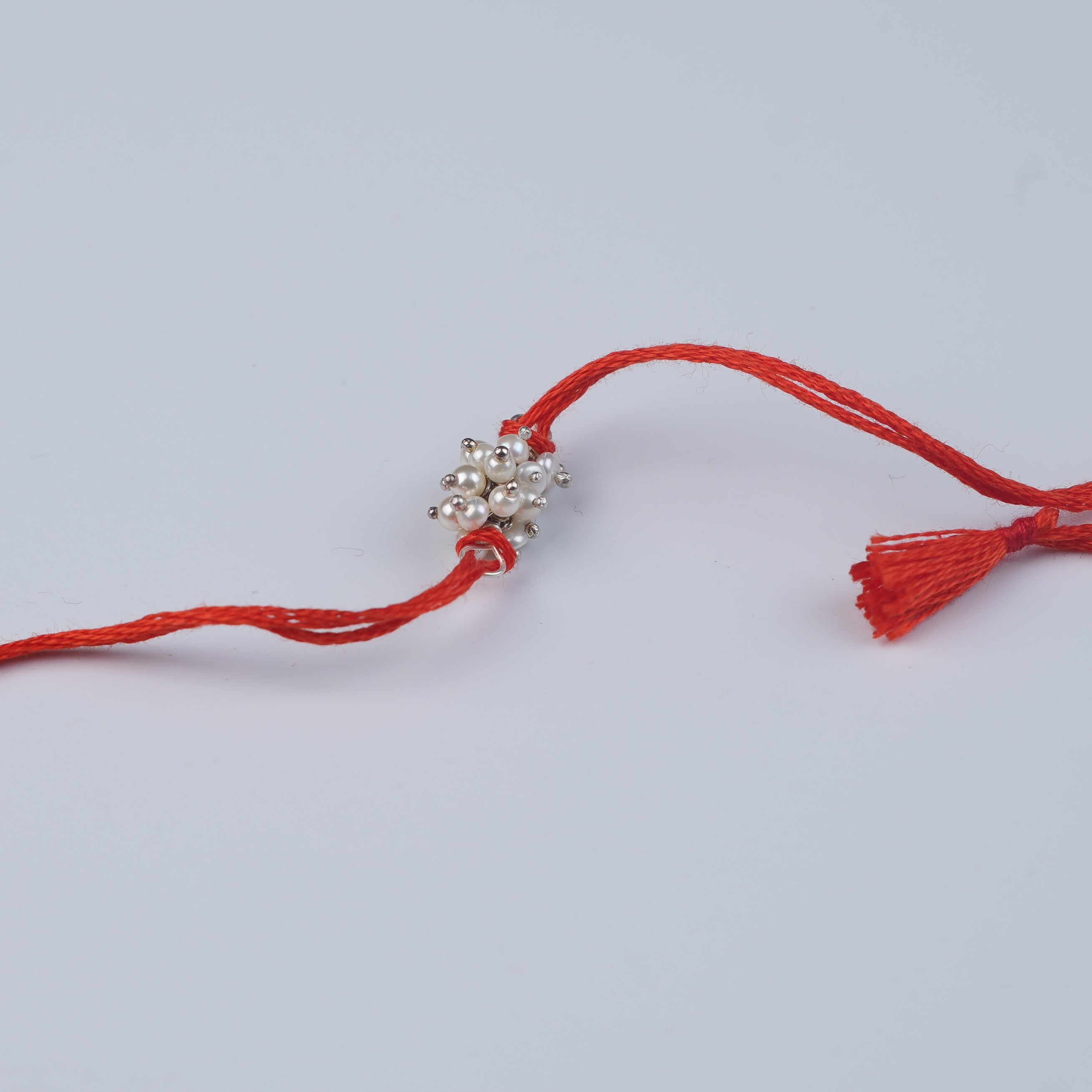Pearl Bunch Rakhi (Project Handmade)