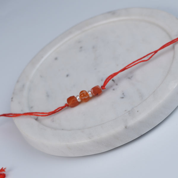 Carnelian & Freshwater Pearl Rakhi (Project Handmade)