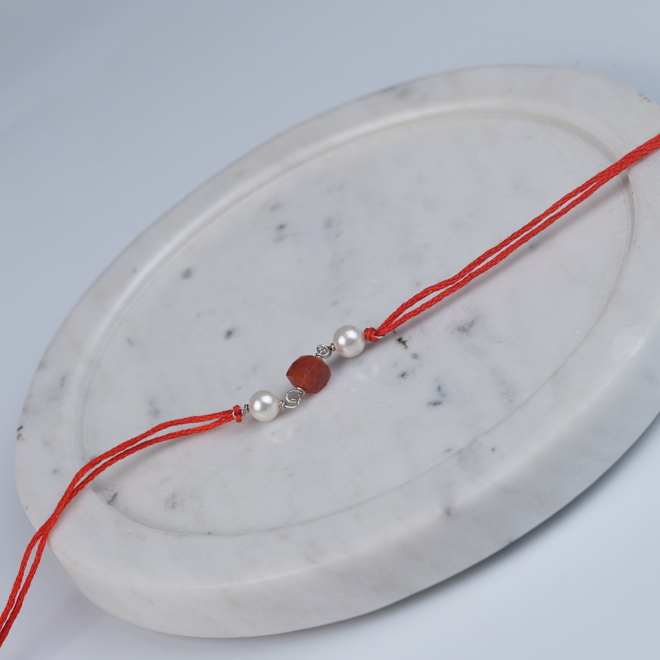 Carnelian & Pearl Rakhi (Project Handmade)
