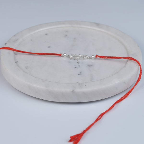 Pearl Ganthan Rakhi (Project Handmade)