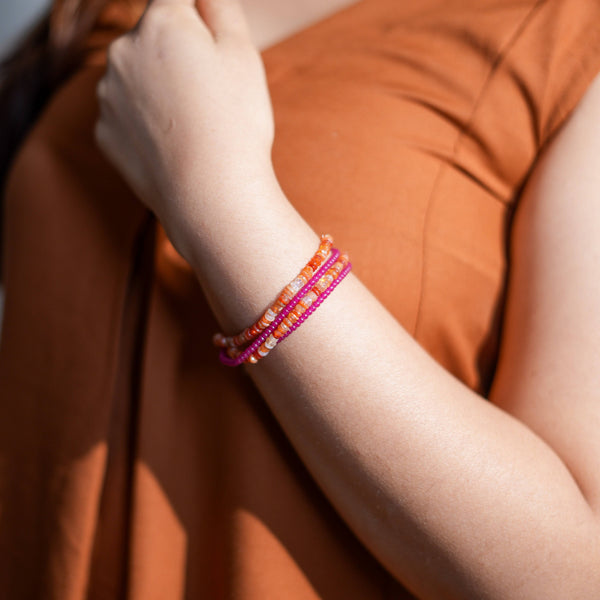 Model wearing Ruby & Carnelian Silver Bracelet in 92.5 sterling silver for an elegant handcrafted jewellery look