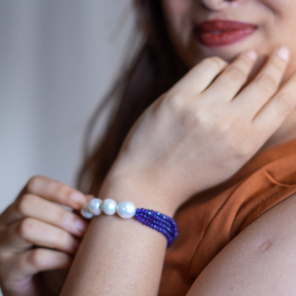 Model wearing Purple Jade & Baroque Pearl Silver Bracelet in 92.5 sterling silver for an elegant handcrafted jewellery look