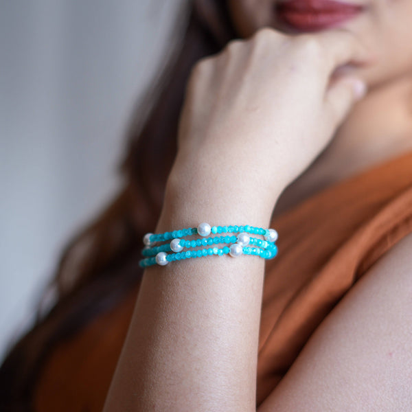 Model wearing Blue Jade & Pearl Silver Bracelet in 92.5 sterling silver for an elegant handcrafted jewellery look