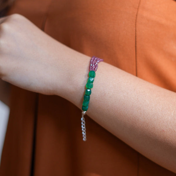 Model wearing Green Onyx & Rhodonite Silver Bracelet in 92.5 sterling silver for an elegant handcrafted jewellery look