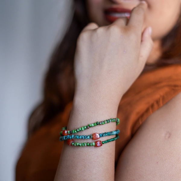 Model wearing Carnelian, Green Onyx, Green Jade & Blue Jade Silver Bracelet for a vibrant handcrafted jewellery look