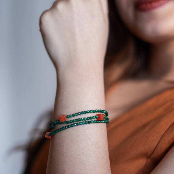 Model wearing Green Onyx & Carnelian Silver Bracelet in 92.5 sterling silver for an elegant handcrafted jewellery look