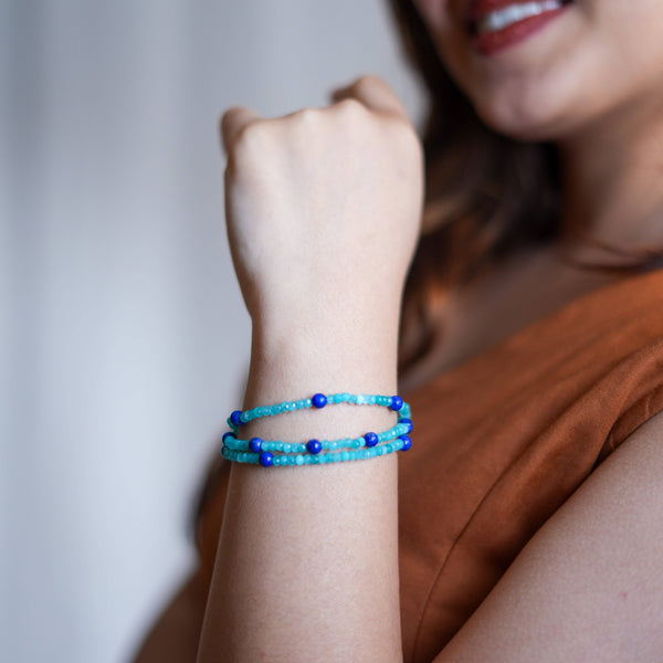 Model wearing Blue Jade & Lapis Lazuli Silver Bracelet in 92.5 sterling silver for an elegant handcrafted jewellery look