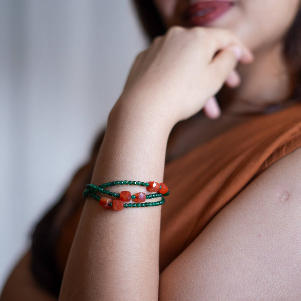 Model wearing Green Onyx & Carnelian Silver Bracelet in 92.5 sterling silver for an elegant handcrafted jewellery look