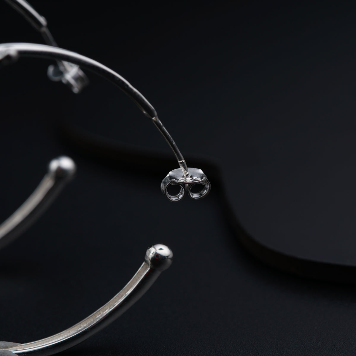 a pair of glasses sitting on top of a table