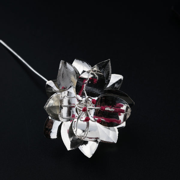 Silver floral ornament with red beads for home decor