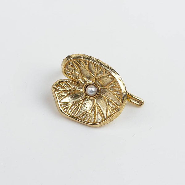 Flat-lay of Silver Saroj Parna Earcuff (Single) | 22K Gold-Plated with premium styling accessories and elegant presentation