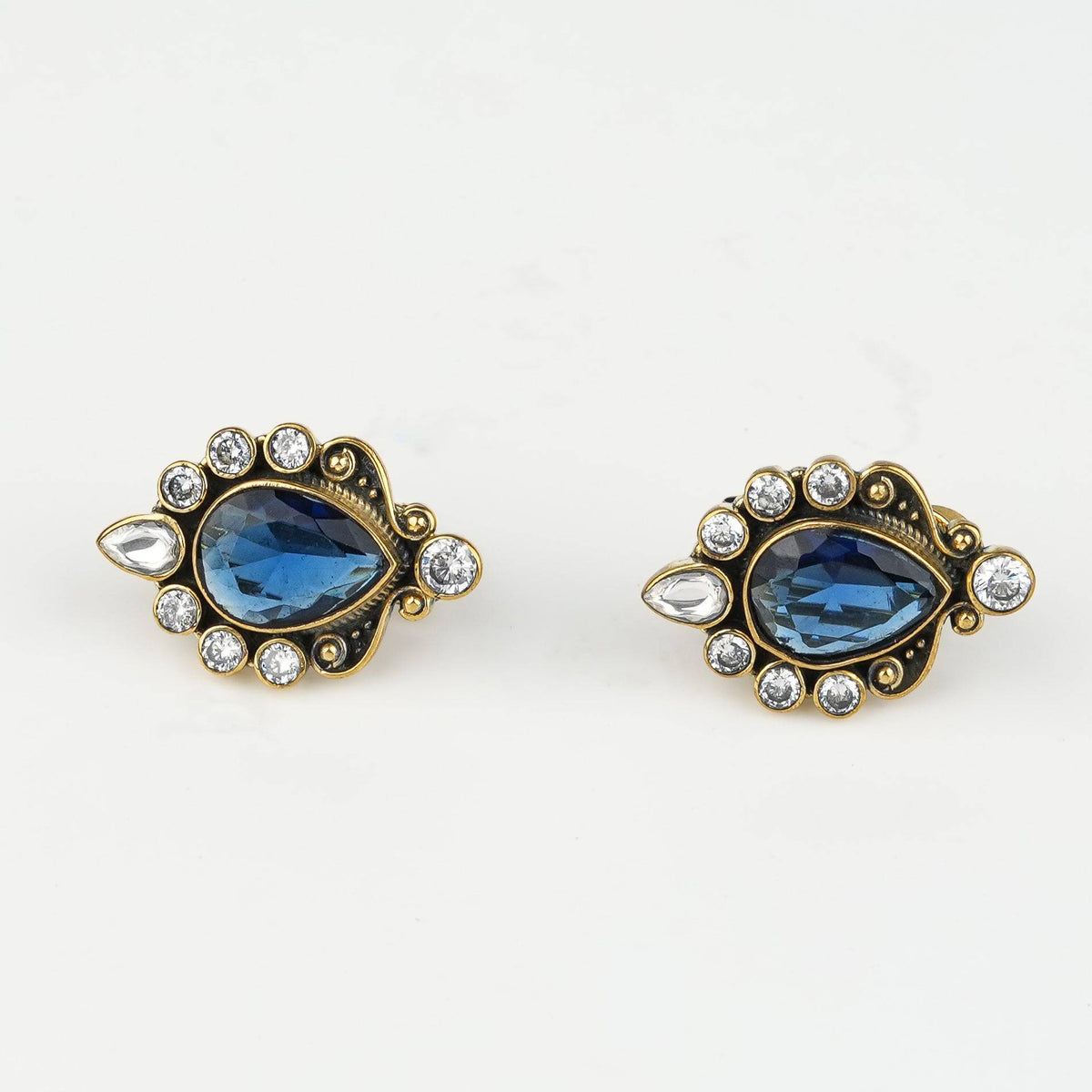 Close-up of Brass Fashion Earrings showcasing intricate detailing, textured elements, and fine craftsmanship