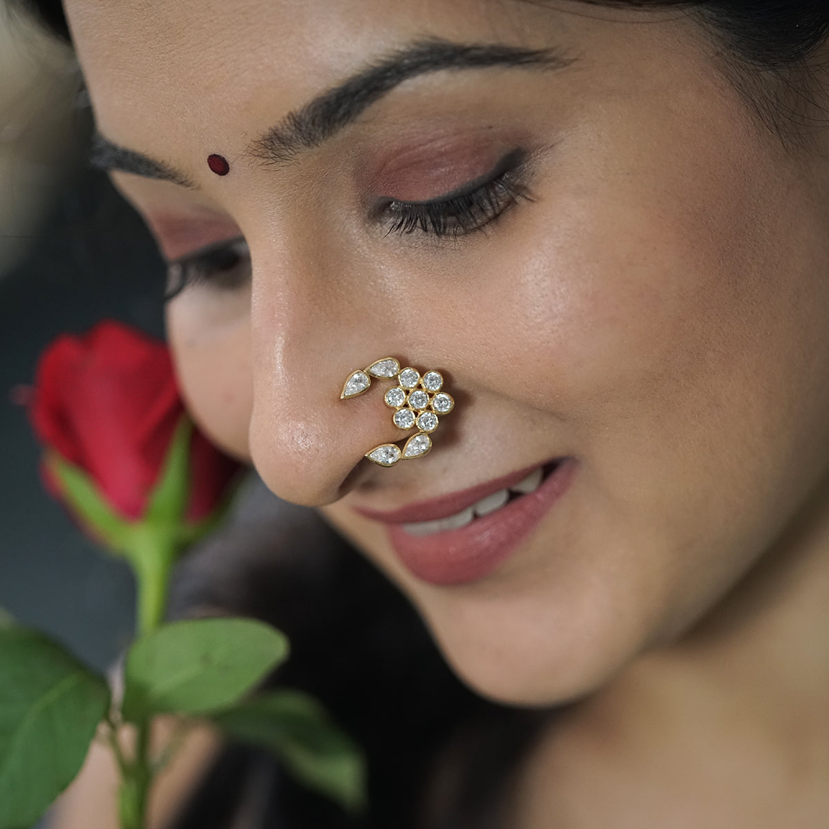 Floral cubic zirconia nath gold plated silver detailing