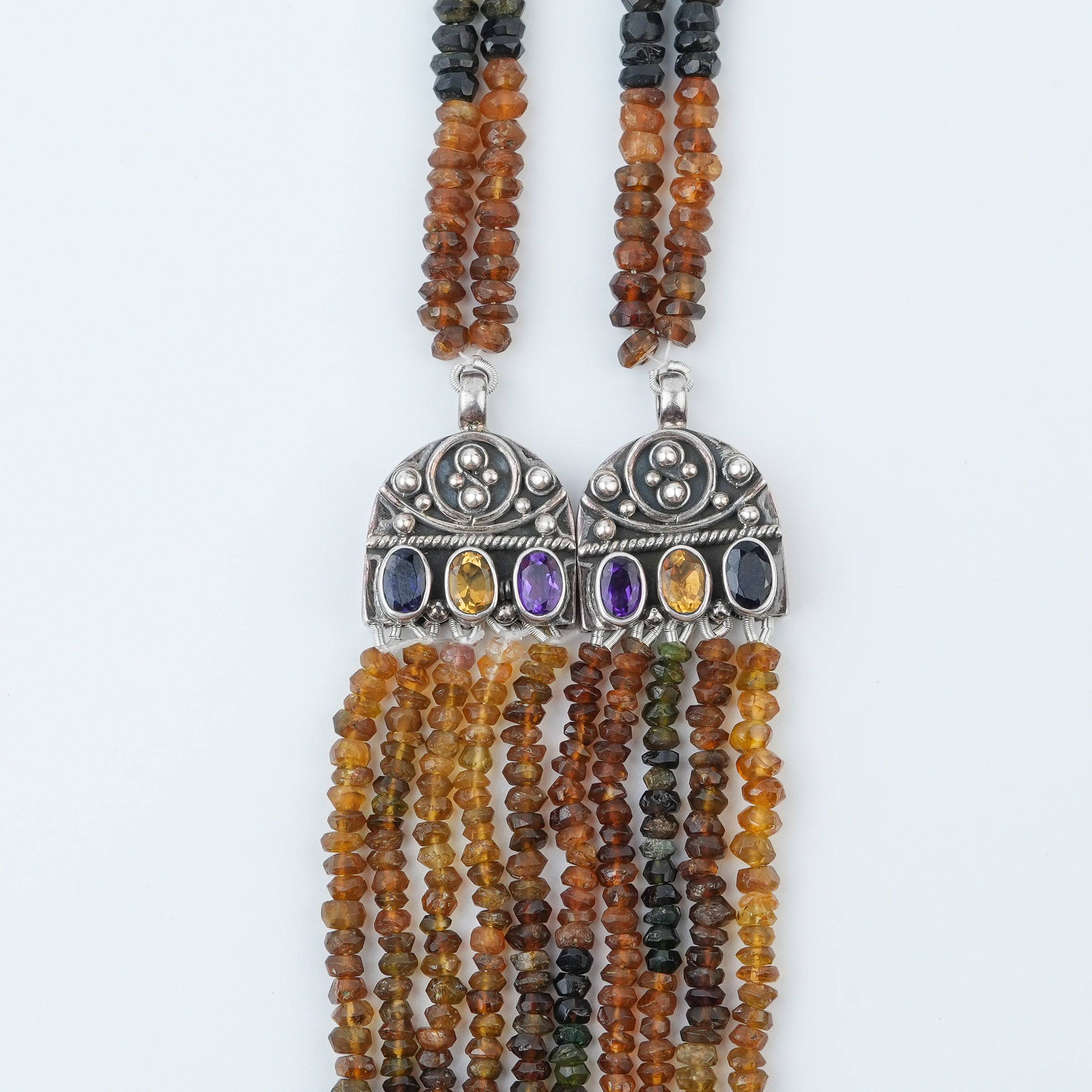 Close-up of Silver Tourmaline Layered Necklace showcasing natural tourmaline stones and intricate silver craftsmanship