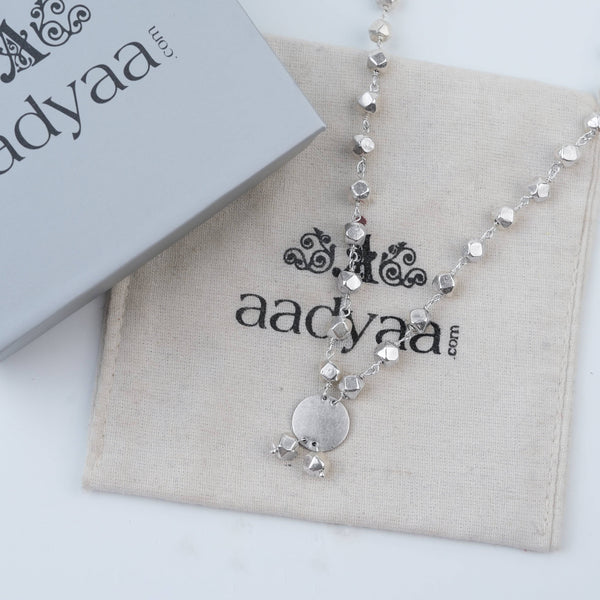 Detailed view of Ashtapailu Necklace with Plain Coin Pendant (Small) highlighting the smooth coin pendant, delicate beadwork, and polished silver finish