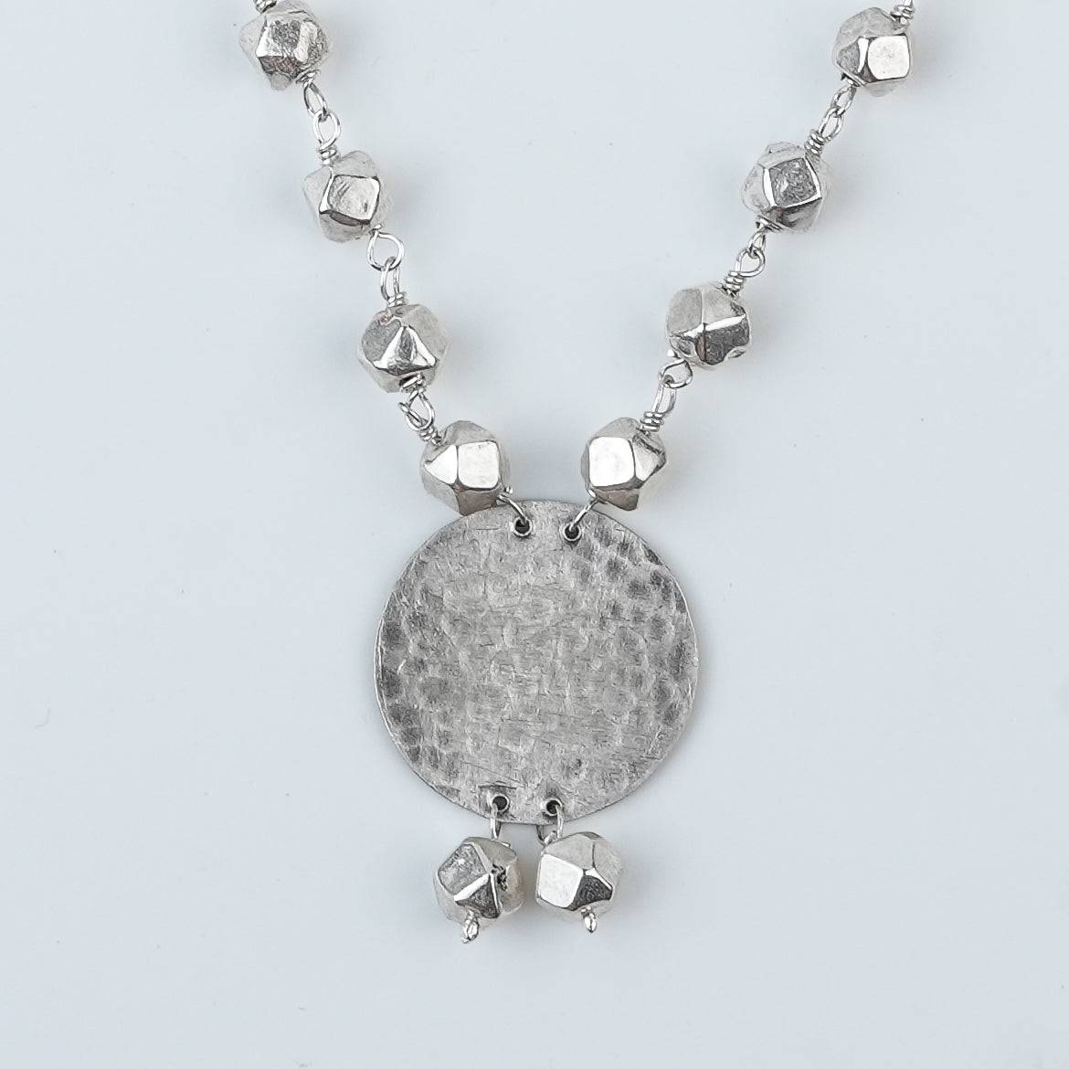 Close-up of Ashtapailu Necklace with Hammered Coin Pendant showcasing intricate Ashtapailu beadwork and handcrafted silver detailing