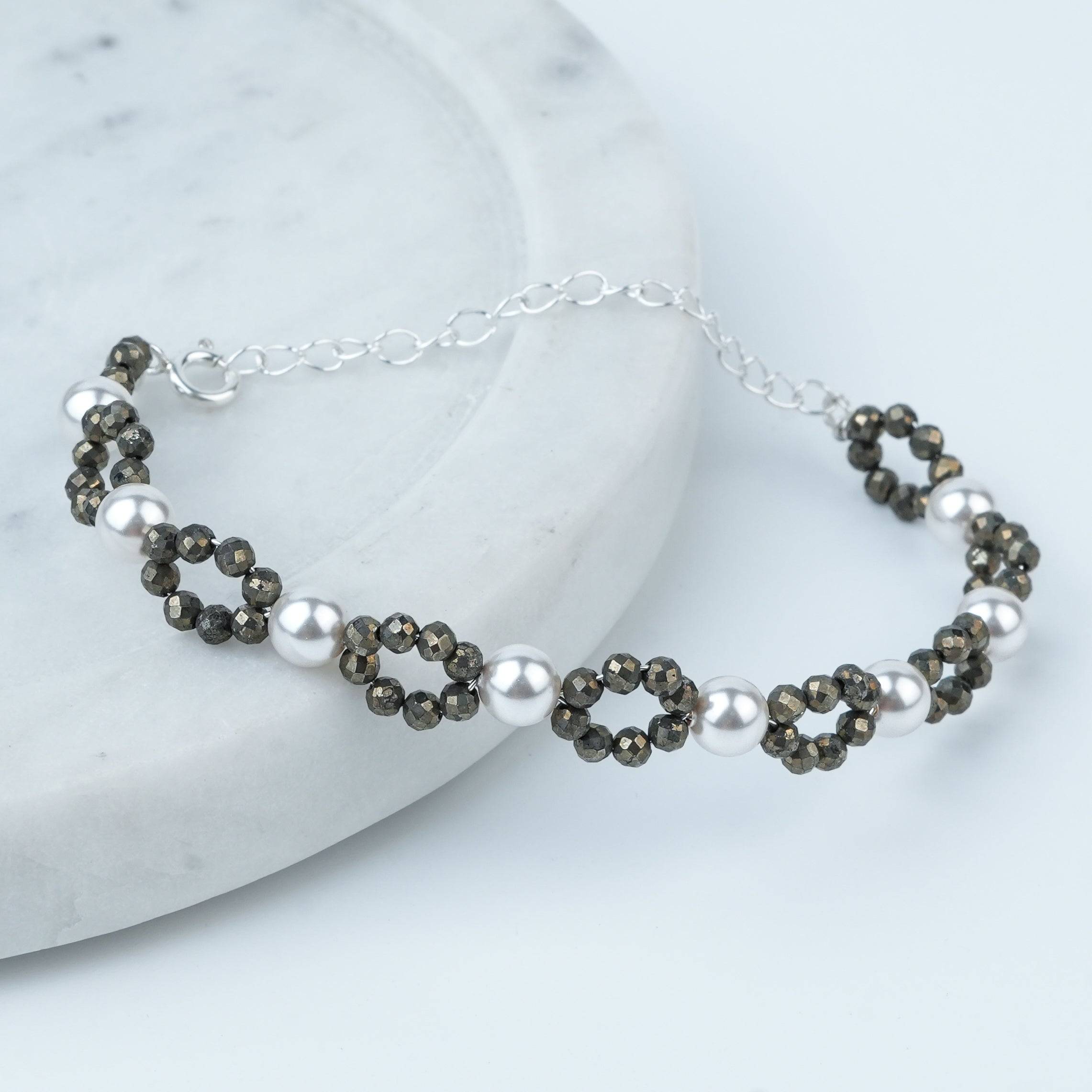 Angled view of Silver Pyrite & Pearl Bracelet in 92.5 sterling silver with pyrite and pearl accents