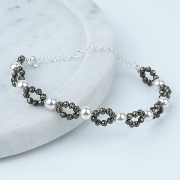 Angled view of Silver Pyrite & Pearl Bracelet in 92.5 sterling silver with pyrite and pearl accents