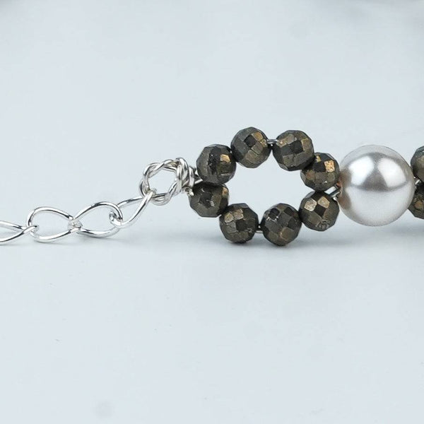 Close-up of Silver Pyrite & Pearl Bracelet showcasing natural pyrite, lustrous pearls, and intricate silver craftsmanship