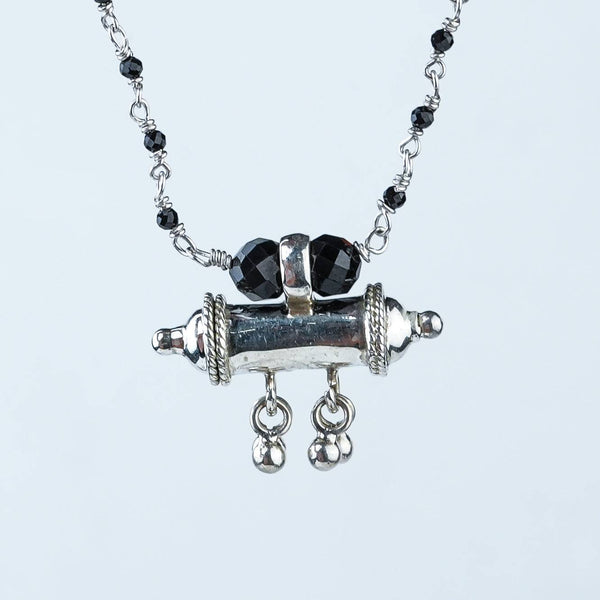 Close-up of Black Spinel Ganthan Necklace with Tait Pendant showcasing black spinel beads, intricate Ganthan work, and fine silver craftsmanship