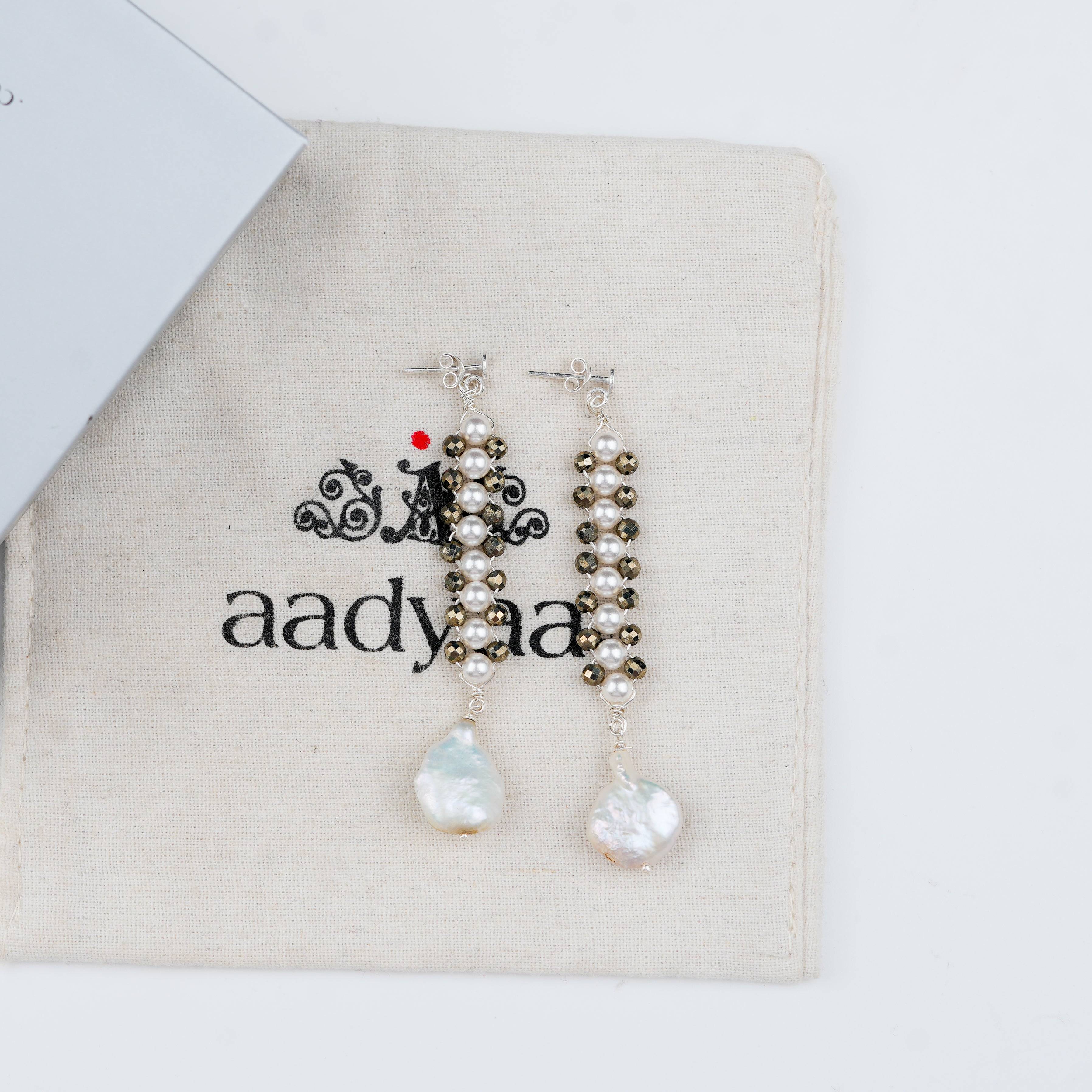Sterling silver earrings with natural pyrite and pearl accents