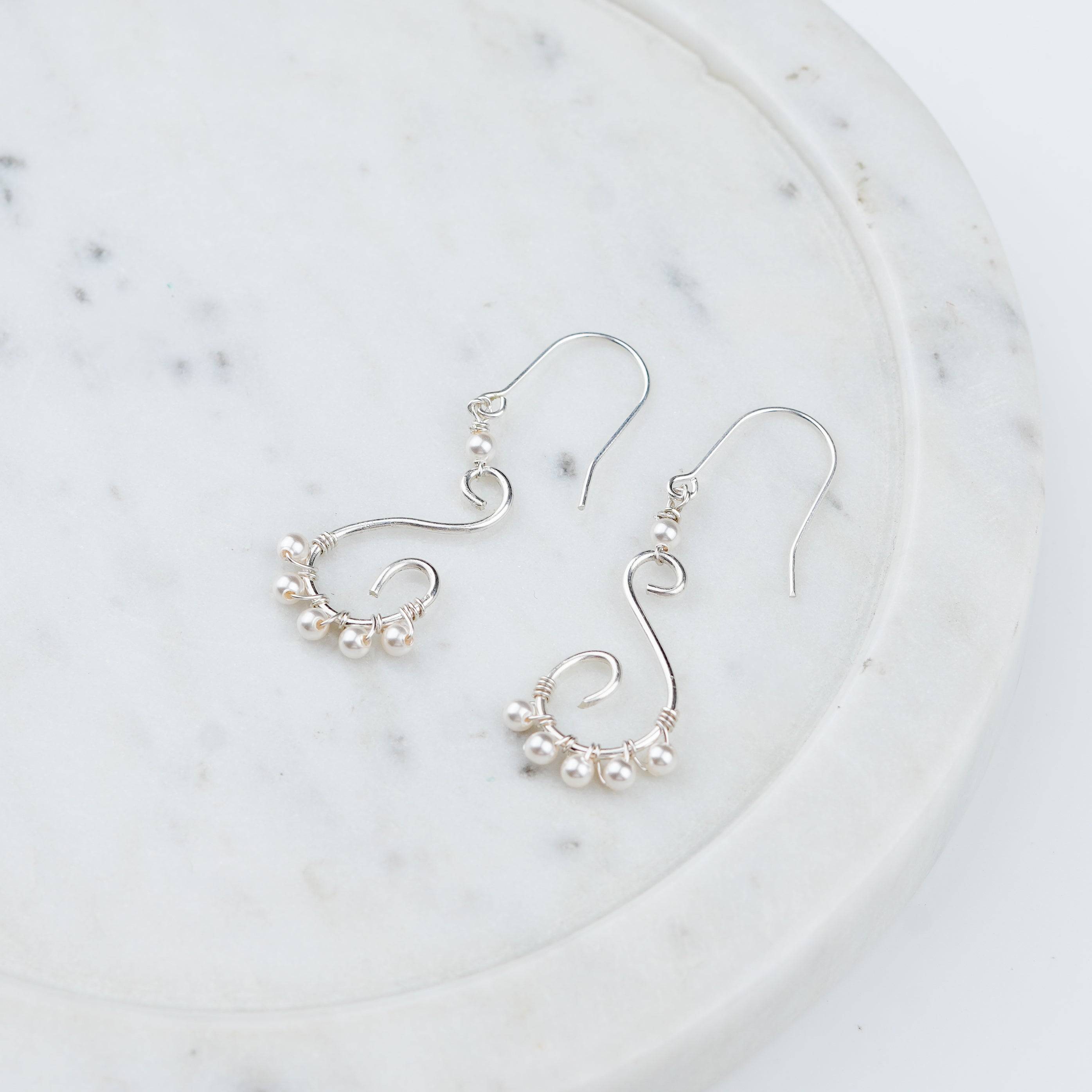 Close-up of Wire-Wrapped Pearl Earrings craftsmanship