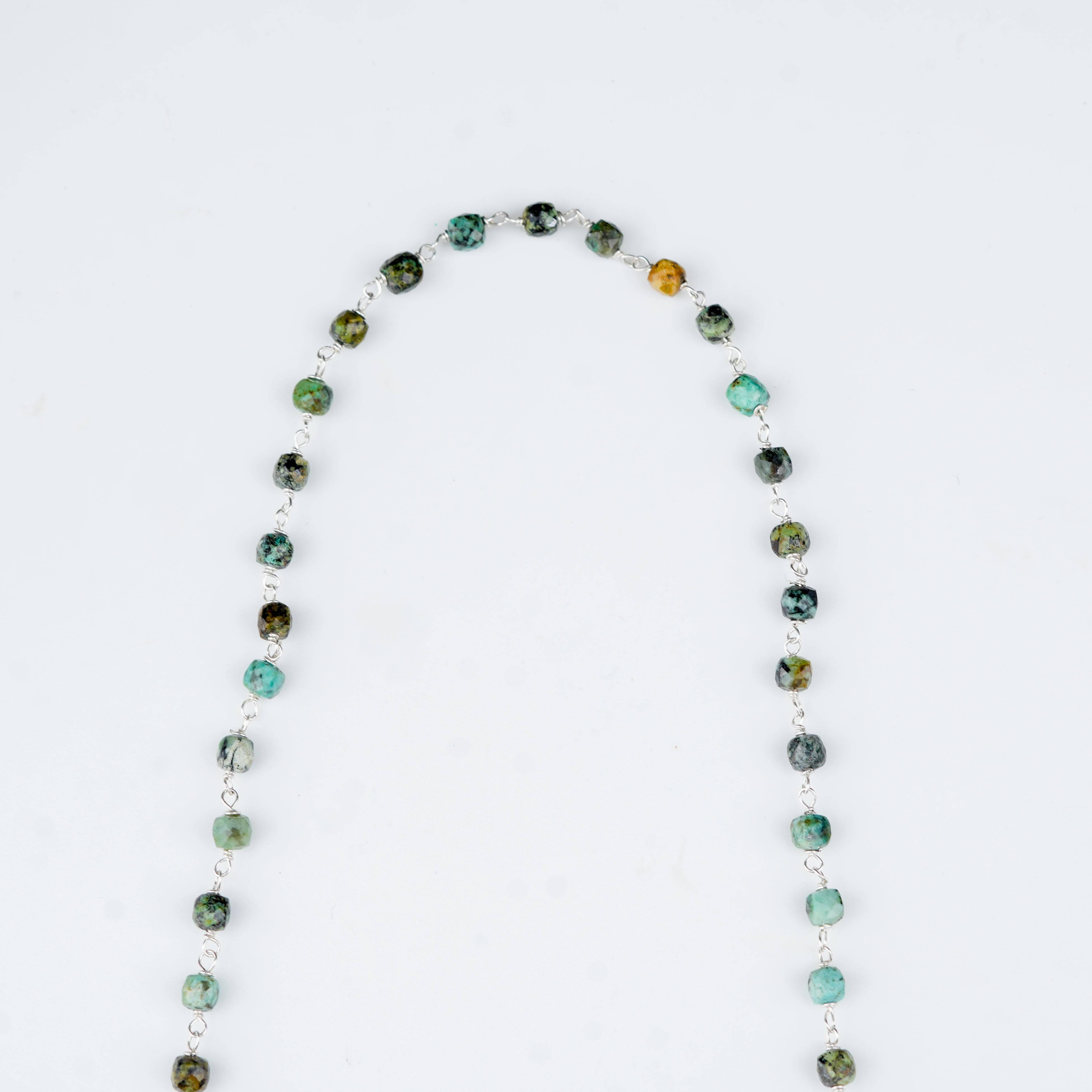 Handcrafted pearl and blue gemstone necklace for festive styling