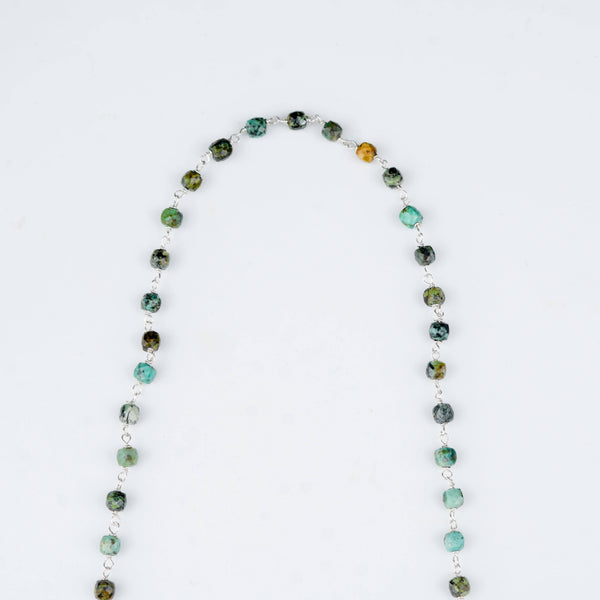 Handcrafted pearl and blue gemstone necklace for festive styling