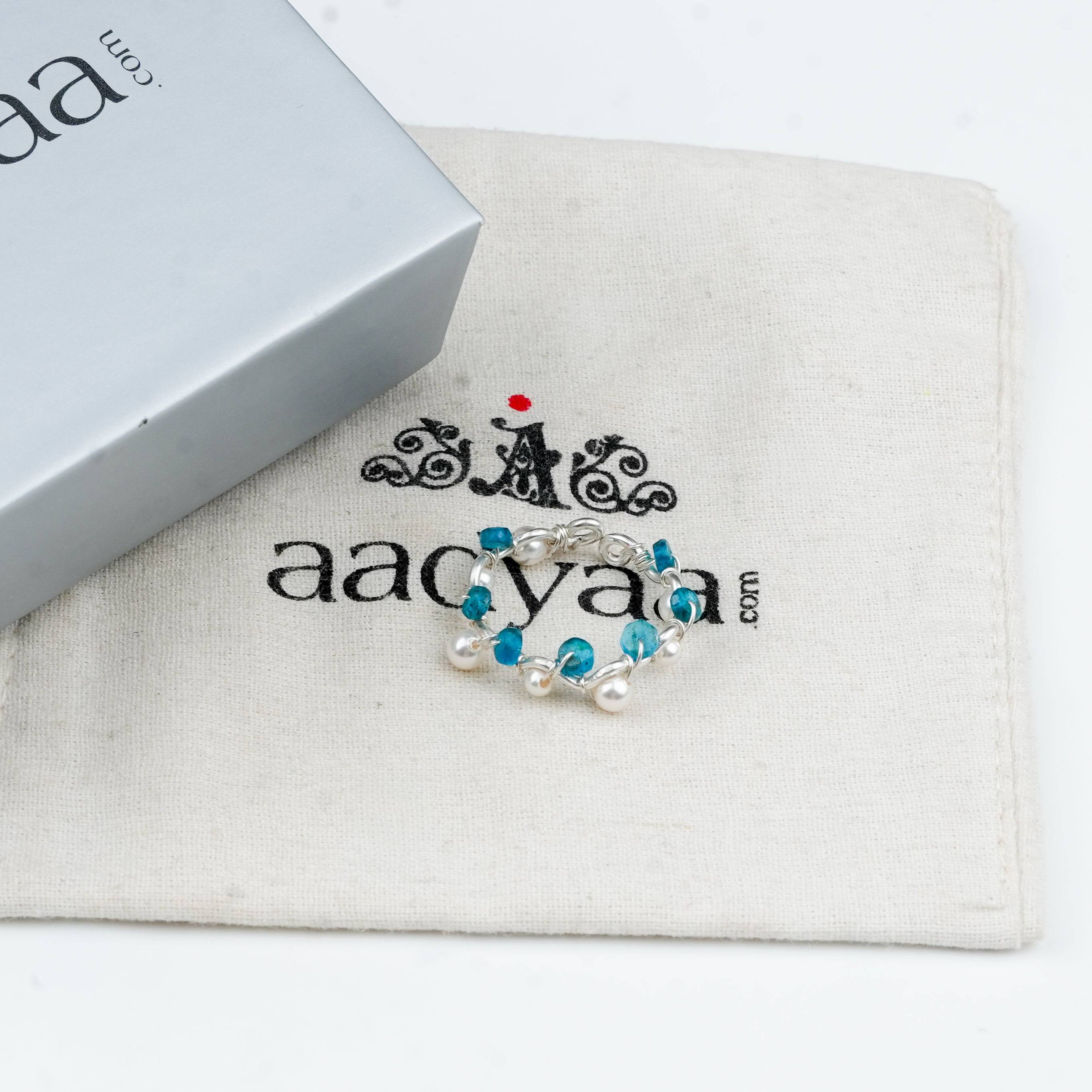 Sterling silver ring with rhodolite gemstone and pearl