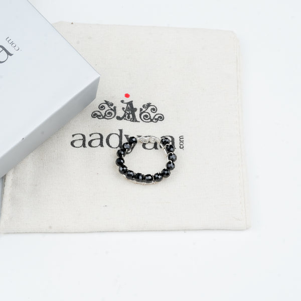 Natural black spinel ring with wrapped sterling silver design