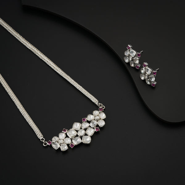 Polki silver necklace with moissanite and pink stones on black background