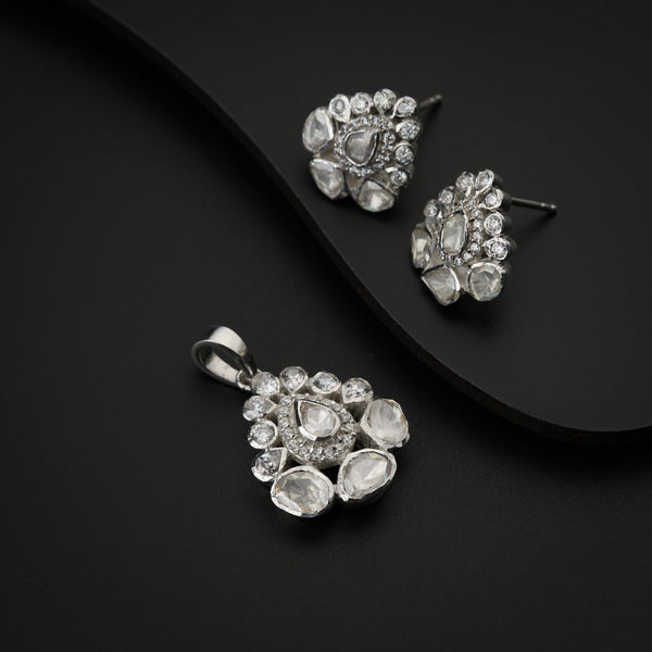Elegant Polki jewelry set with earrings and pendant featuring moissanite