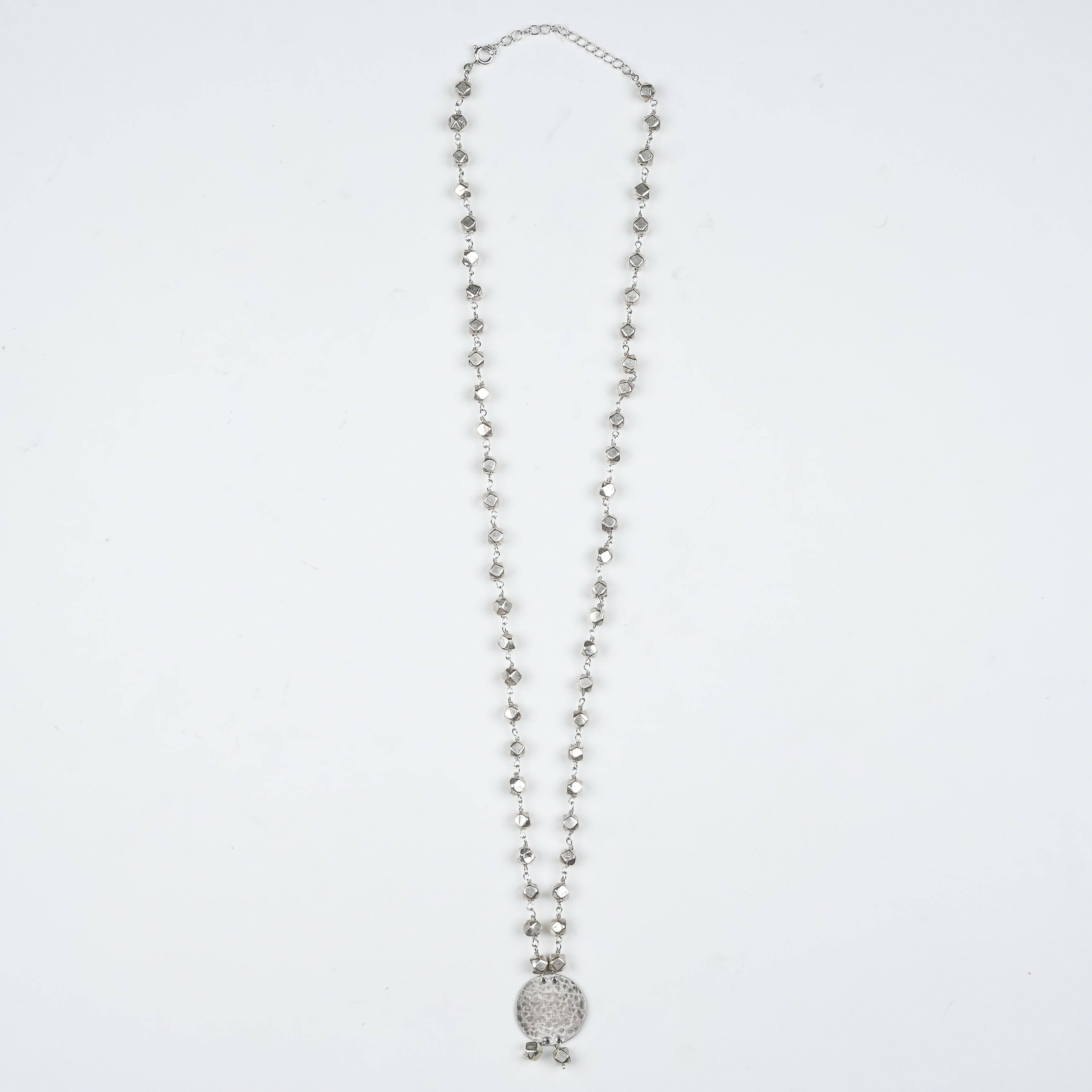 Flat-lay of Ashtapailu Necklace with Hammered Coin Pendant with traditional jewellery and elegant festive accessories