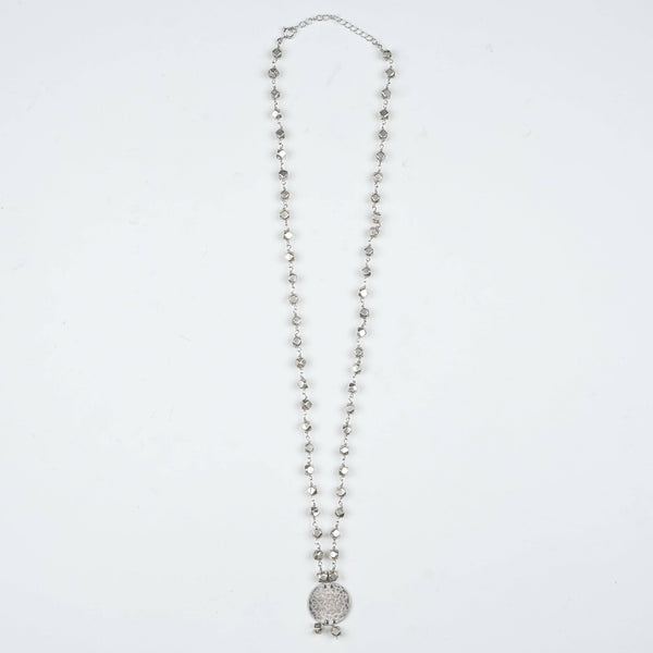 Flat-lay of Ashtapailu Necklace with Hammered Coin Pendant with traditional jewellery and elegant festive accessories