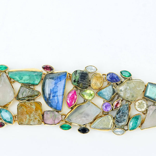 Close-up of a brass fashion bracelet showcasing intricate detailing, textured elements, and fine craftsmanship