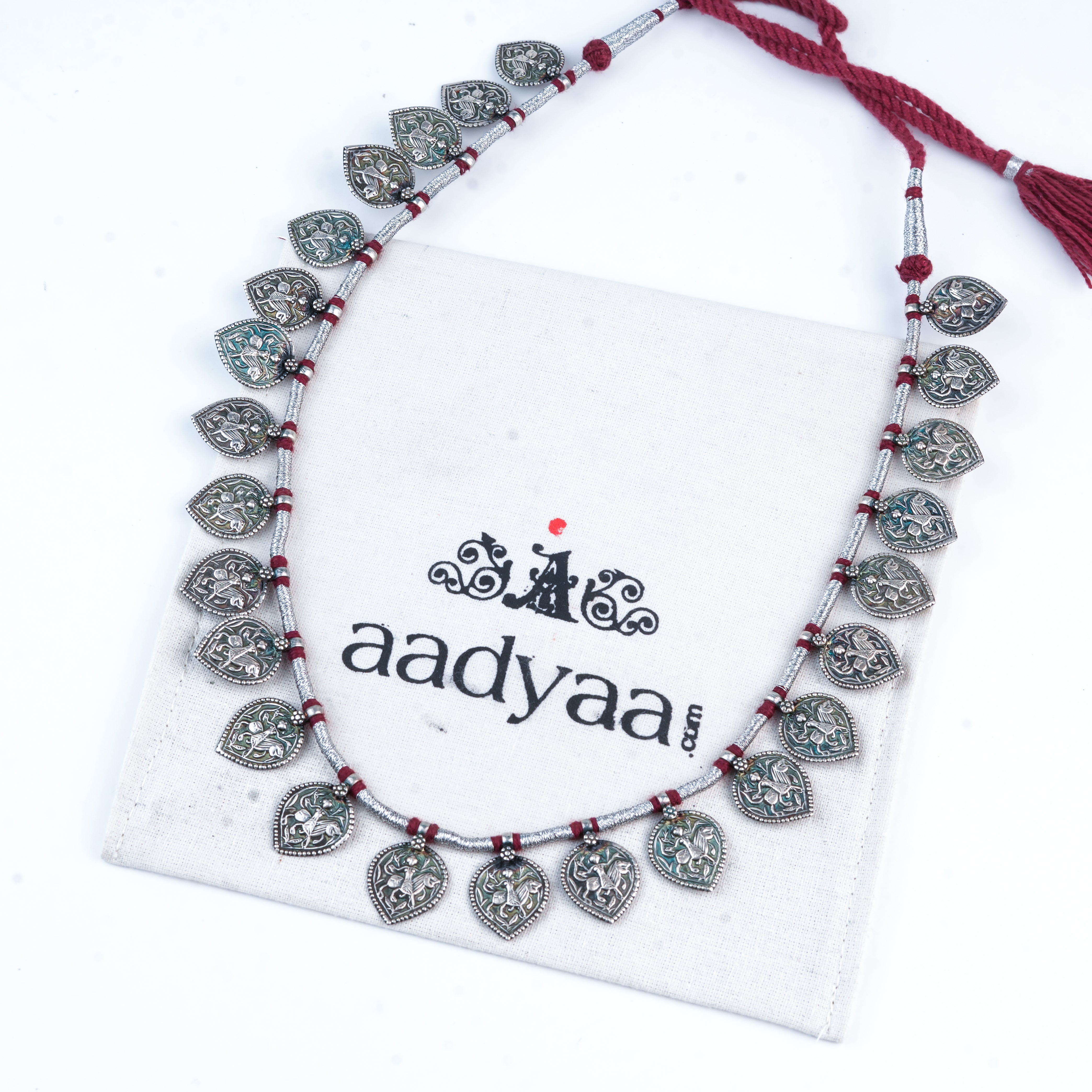 Silver Oxidised Leaf-Shaped Putali Necklace with Red Thread