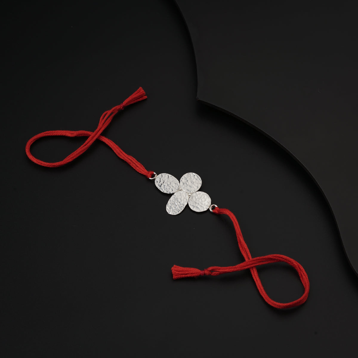 Silver Hammered Flower Rakhi