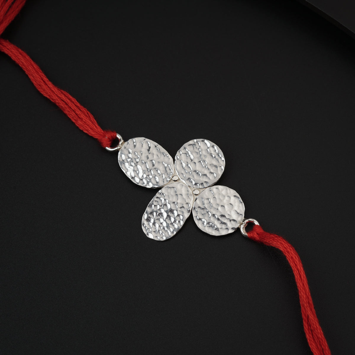 Silver Hammered Flower Rakhi