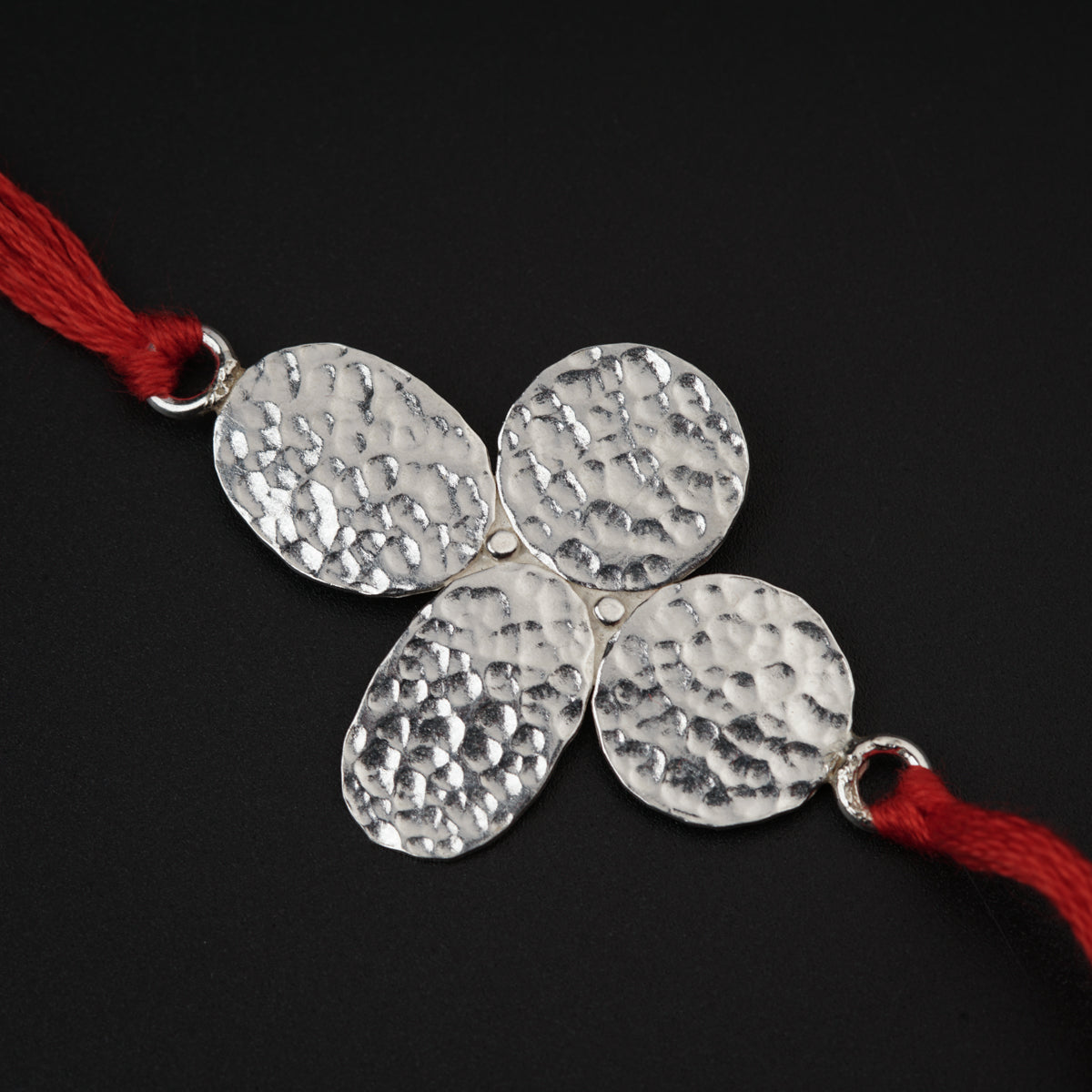 Silver Hammered Flower Rakhi