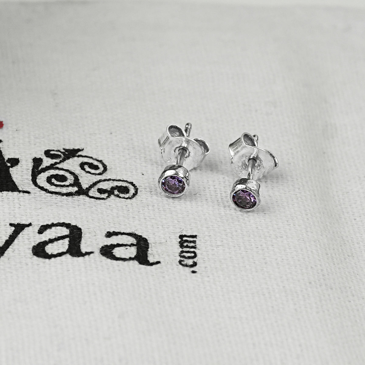 Tiny Purple CZ Stud