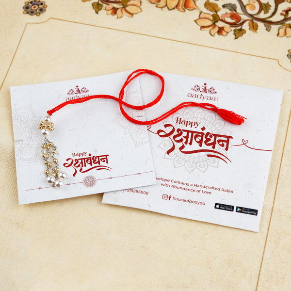 Golden & White Pearl Handmade Silver Lumba Rakhi