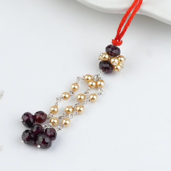 Garnet & Golden Pearl Handmade Silver Lumba Rakhi