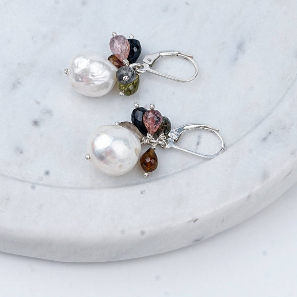 Angled view of Tourmaline Bunch & Pearl Silver Earrings in 92.5 sterling silver with colourful tourmaline and pearl detailing